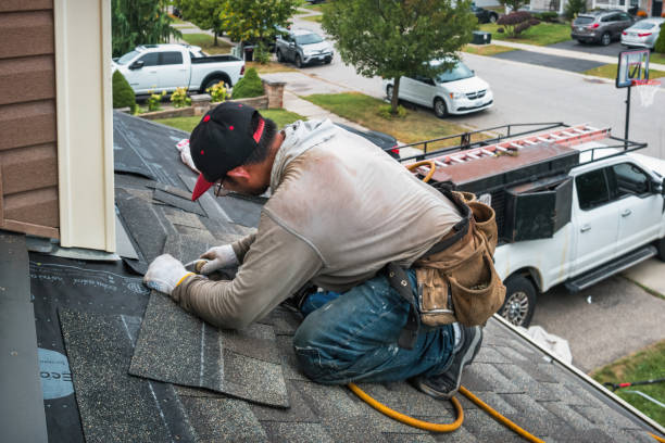 Professional Gutter Repair And Installation technician working in Cold Spring Harbor, NY